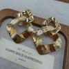 Niche Double Rhombus 8-Figure Buckle Plain Gold Earrings, Retro High-End Earrings, Fashionable And Versatile Earrings.