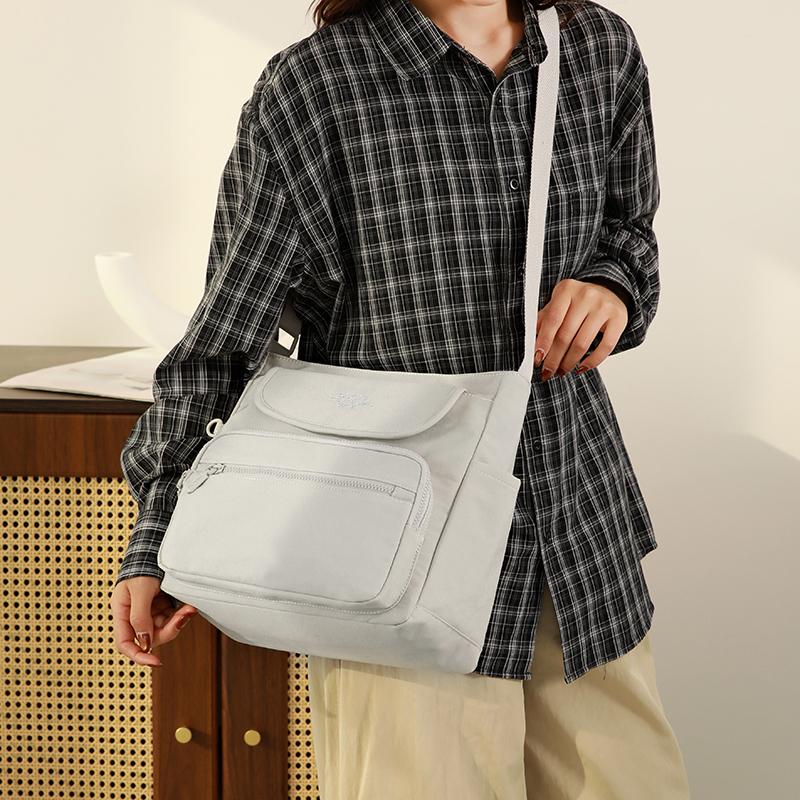Stylish Crossbody Bag with Front Flap and Multiple Pockets for Everyday Use