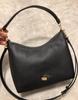 Coach Laurel Hobo Bag: Versatile, Large-Capacity Shoulder, Crossbody, and Handbag for Women.