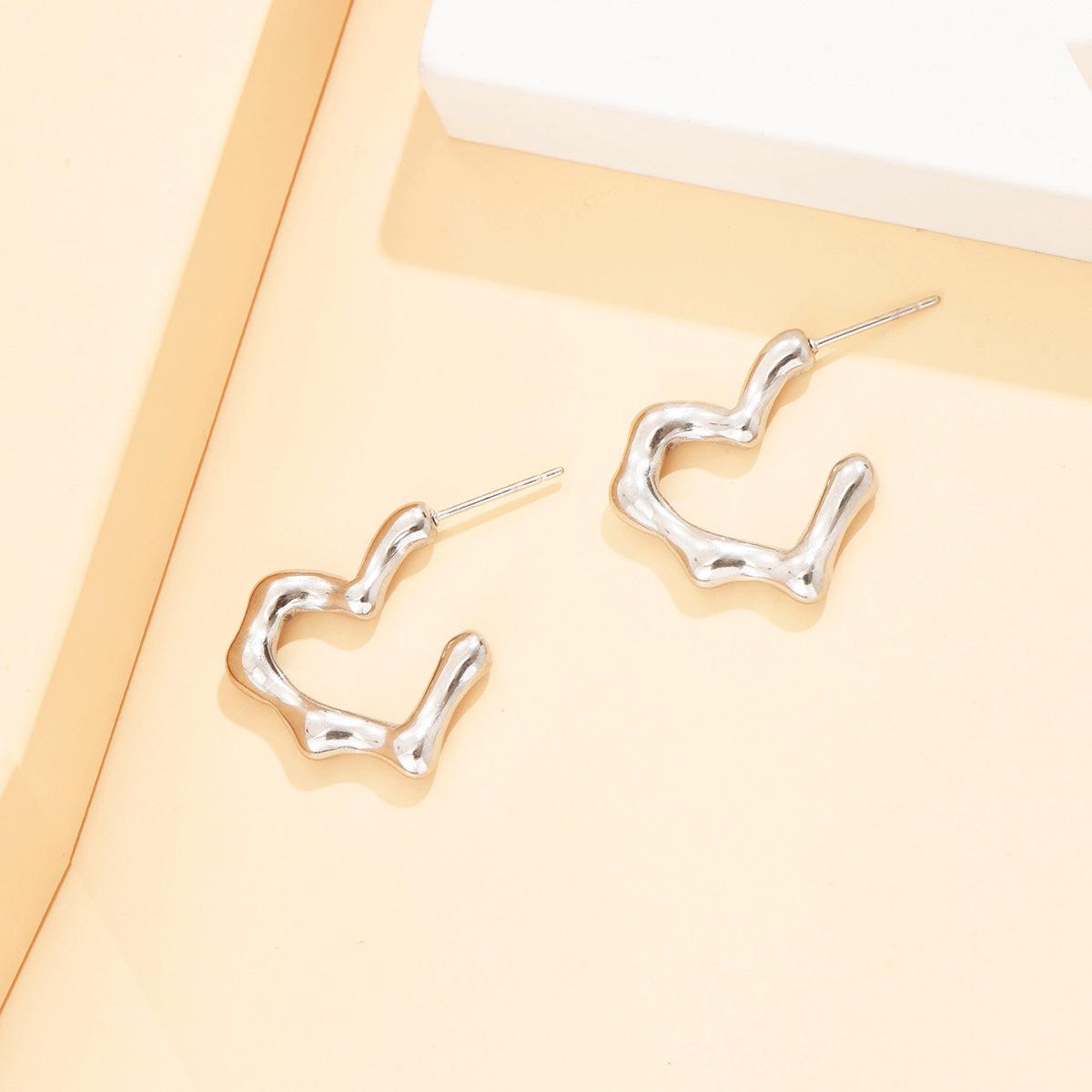Personality Sweet Cool Irregular Heart-Shaped Stainless Steel Earrings for Women - Hollow Love Stud Jewelry