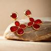 European and American retro oil dripping irregular pleated flower silver needle earrings autumn and winter medieval simple New Year red earrings