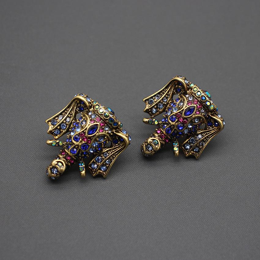 

Винтажные европейские и американские серьги-слоны с австрийскими стразами синий