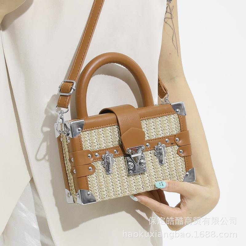 Woven straw bag women's 2025 new niche design messenger bag summer versatile high-end portable small square bag
