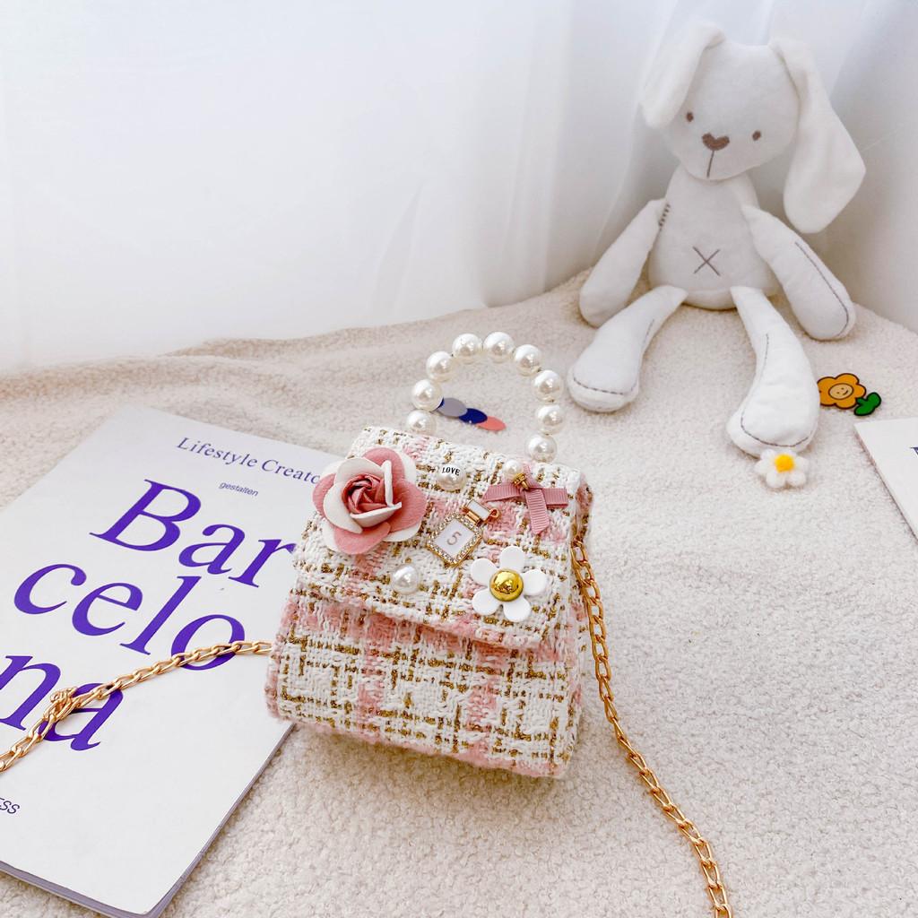 

Adorable Mini Canvas Handbag For Kids Featuring Soft Leather Materials Perfect For Girls Small Flower Light Pink