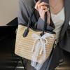 2025 New Niche Design Contrasting Colors Straw Hand-held Bucket Bag Leisure Commuting Vacation Wind Messenger Beach Bag Women