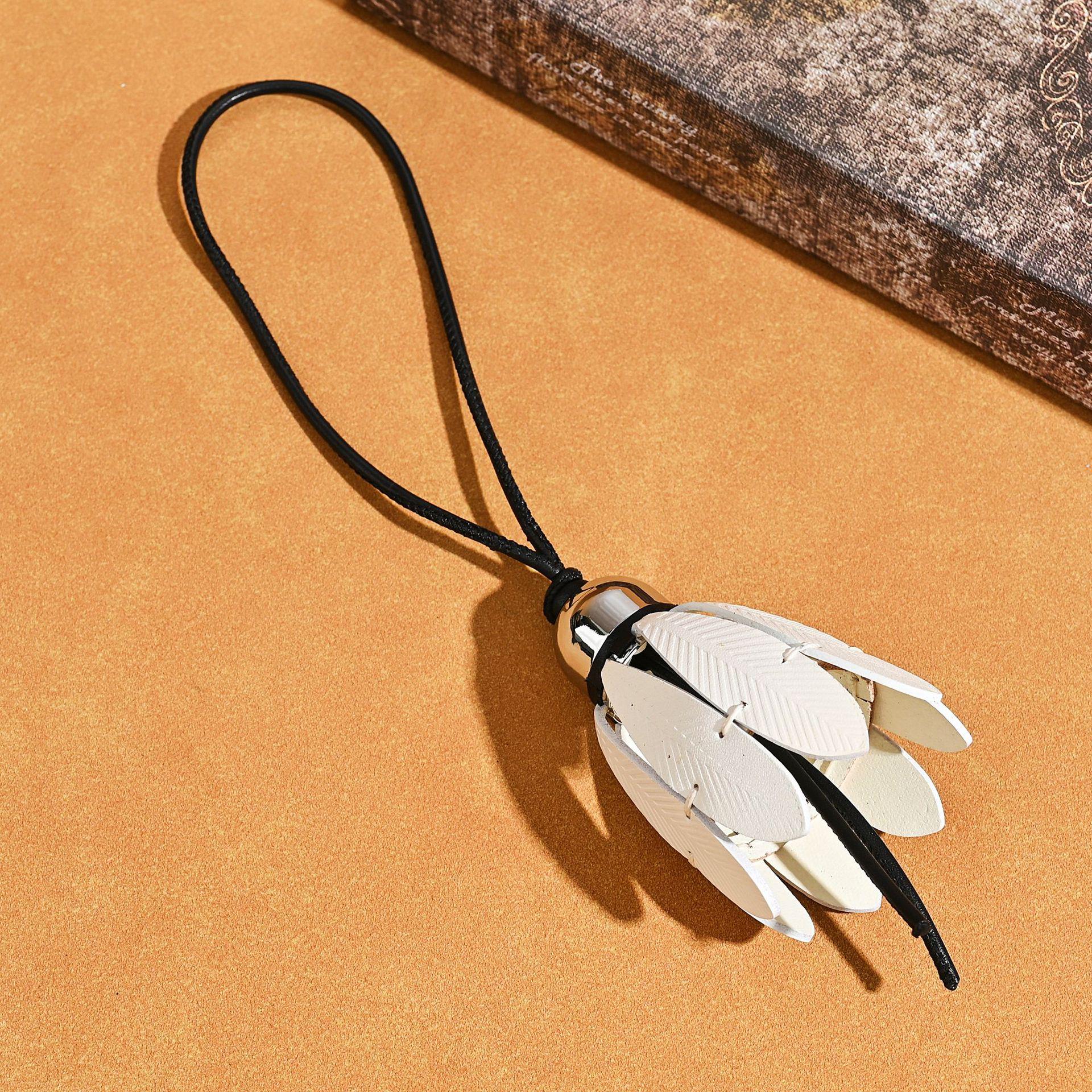 

Titanium Steel & Leather Handmade Badminton Bag Charm: Fashionable and Versatile Ornament