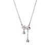 Lily Flower Wind Chime Necklace - Light Luxury Clavicle Chain for Women, High-End Design, Sweet and Elegant.