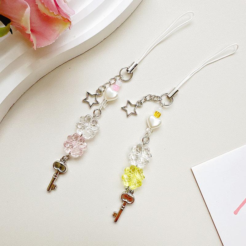 Süßer vierblättriger Kleeblatt-Handyanhänger mit Perlen für Frauen und Mädchen, süßer, exquisiter Schlüsselanhänger, modisches Handy-Lanyard-Geschenk