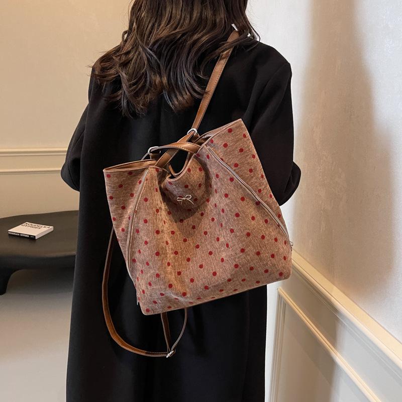 2025 autumn and winter new large-capacity polka dot backpack texture commuter tote bag cute bow shoulder oblique span bag