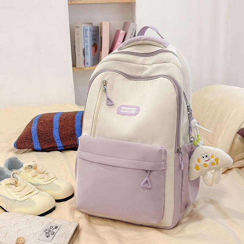 2025 summer new large-capacity literary and versatile high-value schoolbag female junior high school students simple and lightweight backpack