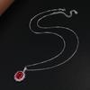 Exquisite Ruby and Garnet Pendant Necklace with Large Pigeon Egg Stone
