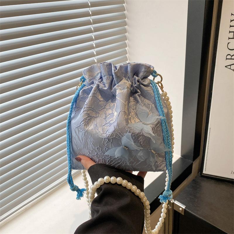 

New Chinese pearl bucket bag 2025 bag women s summer embroidered shoulder bag niche simple and versatile premium messenger bag