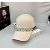 Black hat female trendy brand rhinestone baseball cap showing a small face solid color hard top cap sun protection large brim