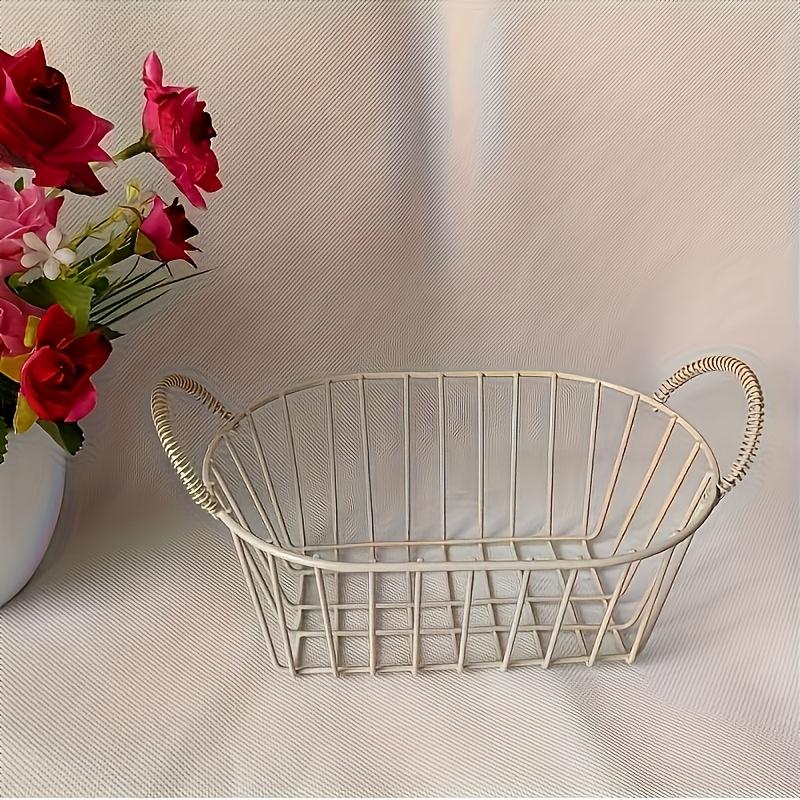 An elegant metal wire basket with stylish handles - featuring a classic black grid design, suitable for home and kitchen storage