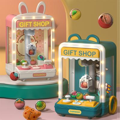 Kids Claw Machine Electronic Arcade Claw Machine With Music Light Toy Grabber Machine With 10 Dolls 10 Capsule Toys