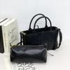 Cross-border hot-selling 28CM cowhide woven portable tote bag, genuine leather handbag, commuting versatile single shoulder messenger women's bag