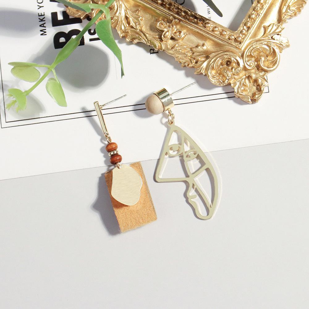 

S925 Silver Needle Asymmetrical Abstract Human Face Earrings: Women s Retro Wooden Studs