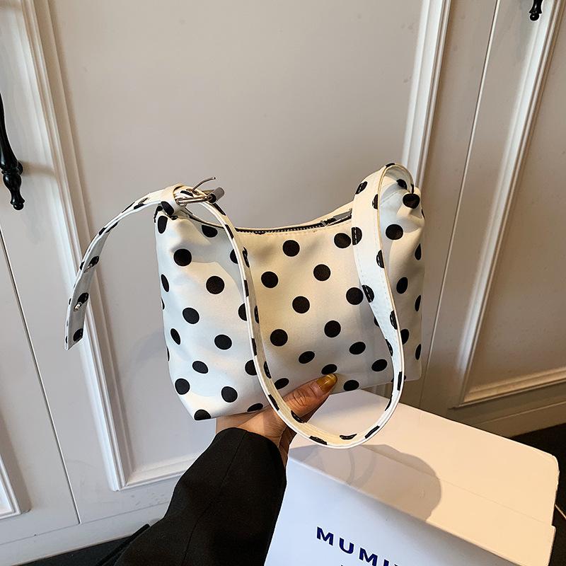 Niche polka dot pillow cloth bag women's new versatile shoulder underarm bag work small bag