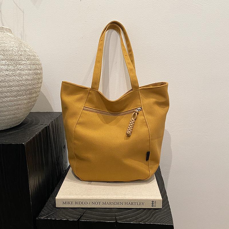 Customized bags for women 2025 new large-capacity tote bags, commuter tote bags, student women's shoulder bags.