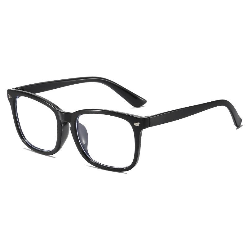 Retro Flat-Lens Anti-Blue Light Glasses with Transparent Frame and Metal Studs, Fashionable for Men and Women.