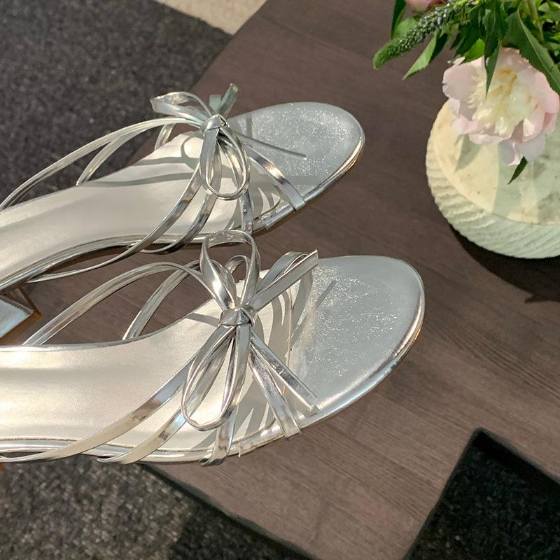 

Sheepskin version, genuine leather silver with skirt, thick heel bow one-word slippers, women s summer wear French high-heeled cool slippers 40