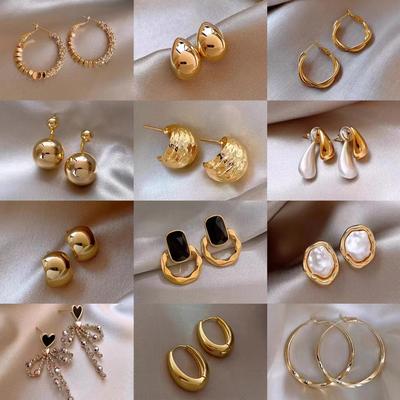 Orecchini rotondi personali in metallo semplice con vento freddo e temperamento di alta moda retrò