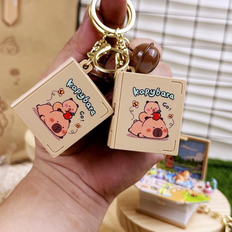 

1Pcs 3D Year Christmas Gift Fold Book Capibala Keychain Children Kids Toy Anxiety Stress Relief Mini Keyring Bag Pendant