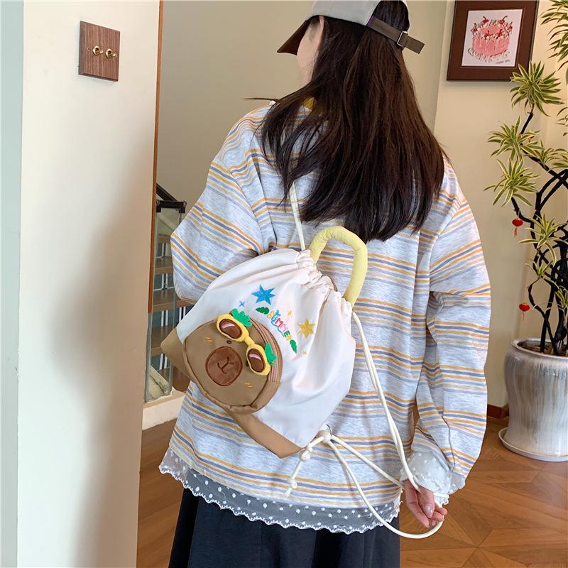 Rucksack mit zwei Schultergurten und Zugbeuteltasche, Zweischultertasche, Greifautomaten-Puppe Handtasche