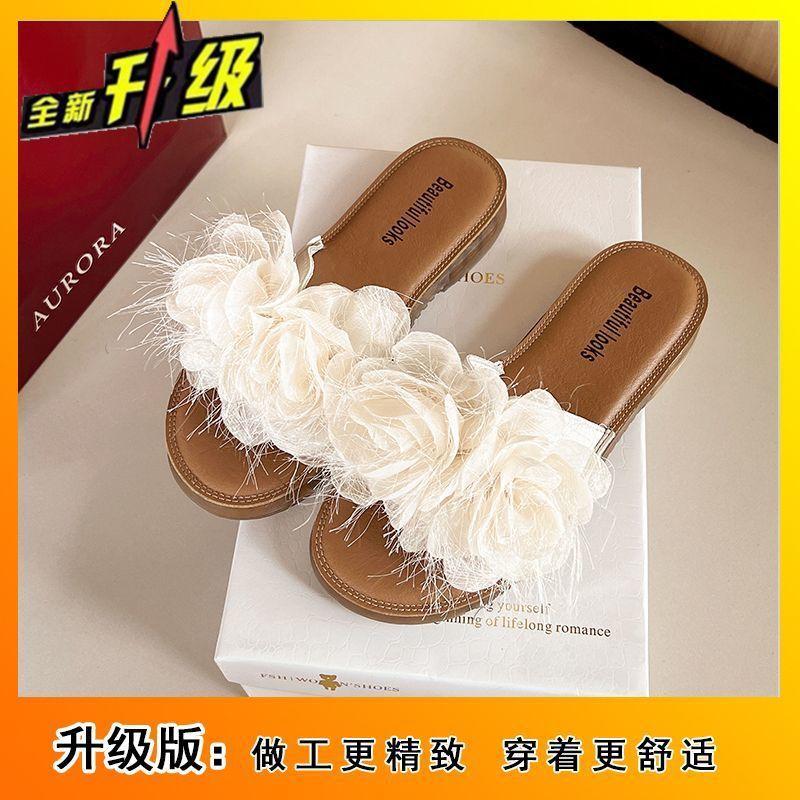 Versatile outer wear flower beach cool slippers women's 2025 summer new beautiful flat flat one-word shoes go out