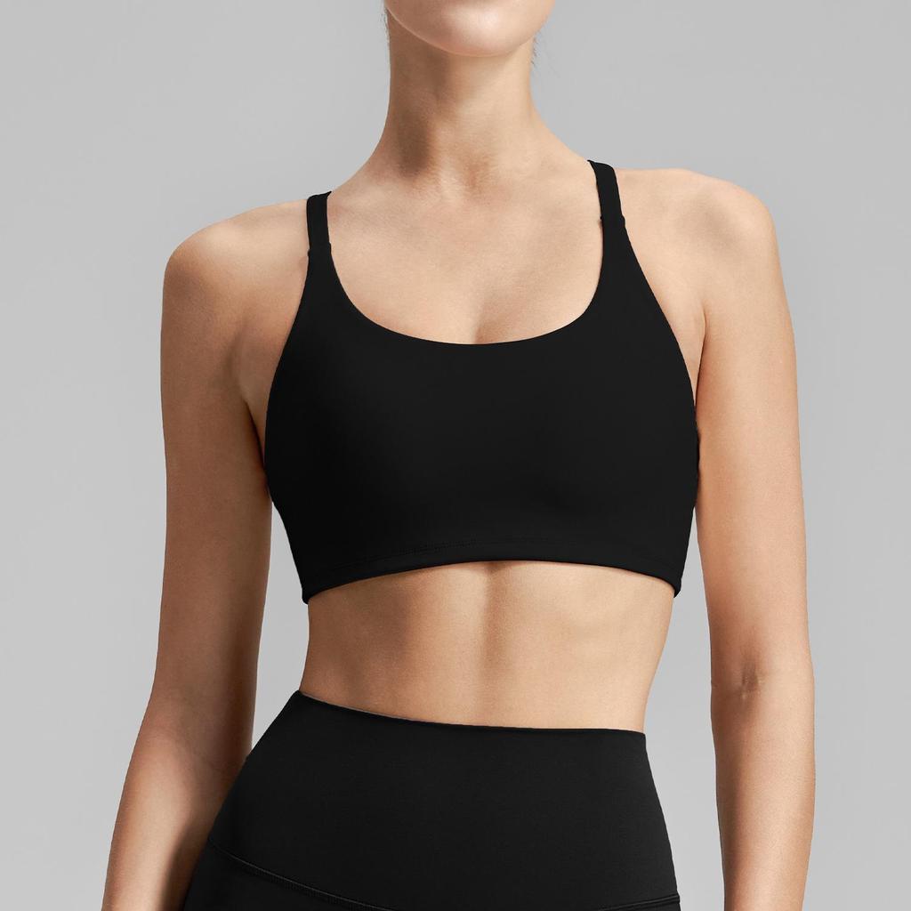 Women's Cross-Back Sports Bra: Sexy, Stylish Design for Pilates, Fitness, and Yoga, with Fixed Cups and Thin Straps for Outdoor Wear.