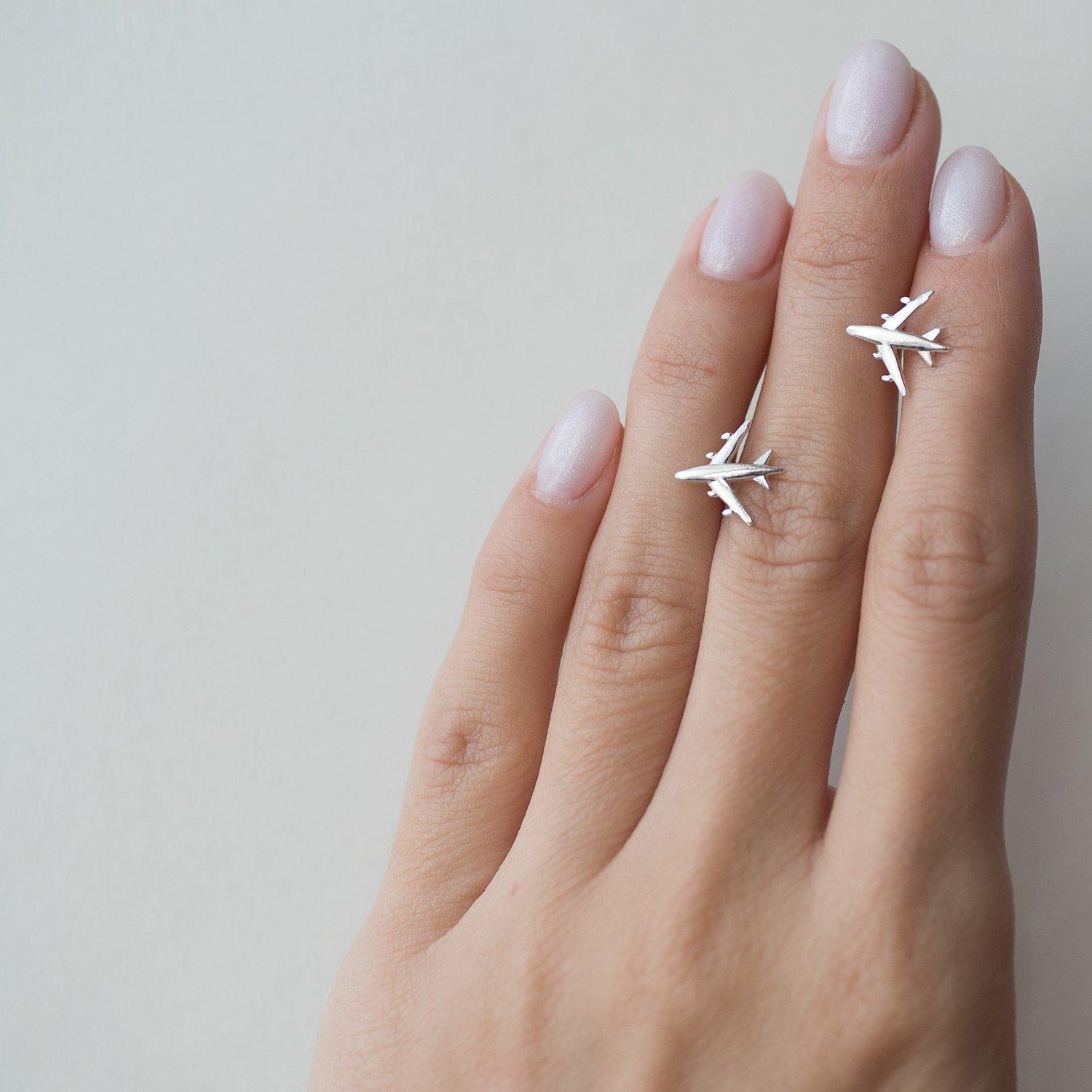 

Срібні сережки-Пусети Мандрівники Oniks 1.2 x 1.1 cm срібний