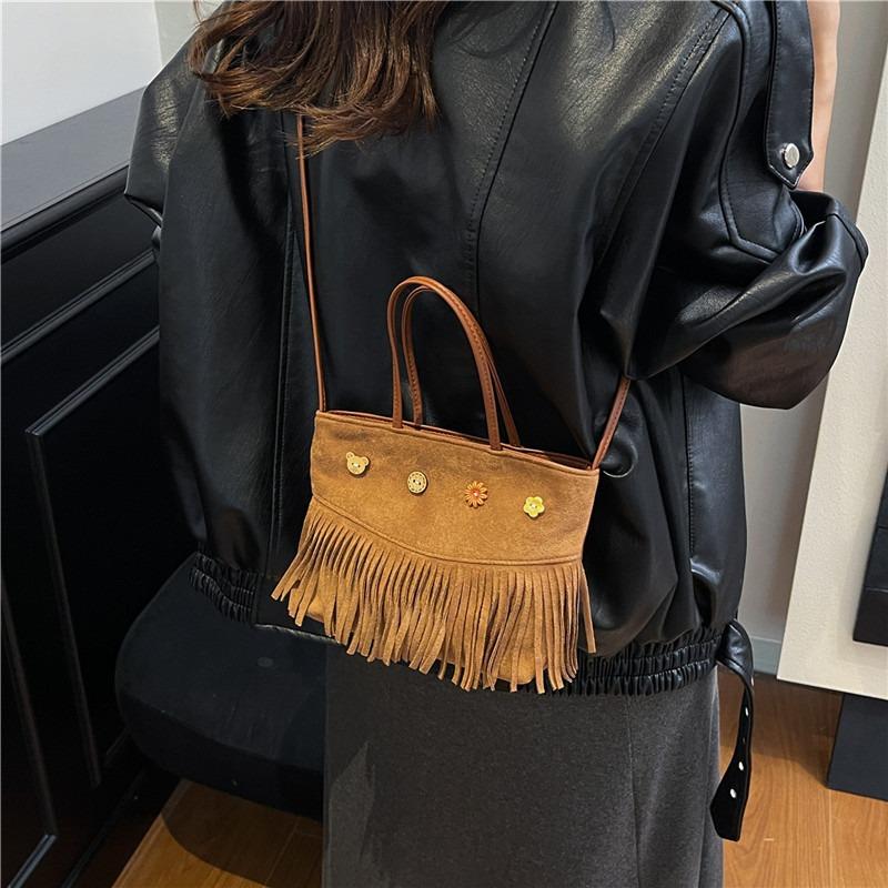 Autumn and winter high-end light luxury niche fringed bag women's new retro brown fashion portable messenger bag
