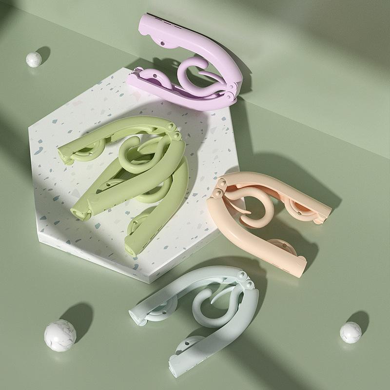 Portable Travel Folding Clothes Hanger for Drying and Sunning - Ideal for Business Trips and Dorm Use