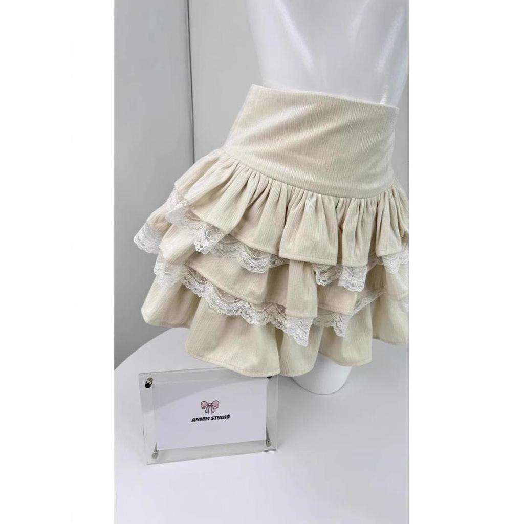 Aprikosenfarbener A-Linien-Midirock mit hoher Taille, Spitzen-Patchwork und bauschigen Lagen