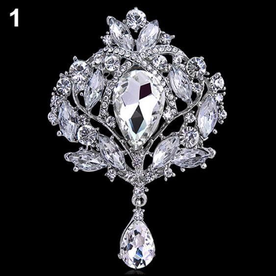 

Женская металлическая брошь с горным хрусталём серебряный/белый