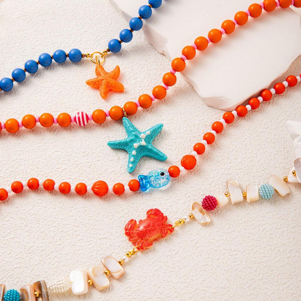 European-American Summer Ocean Necklace: Shell, Crab, Fish, Starfish Stone Pendant & Colorful Beaded Chain for Women