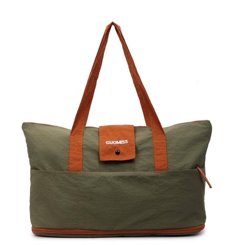 

Splicing Macaron Color Short Trip Bag Sleeve Rod Foldable Storage Large Capacity Luggage Boarding Bag зелений