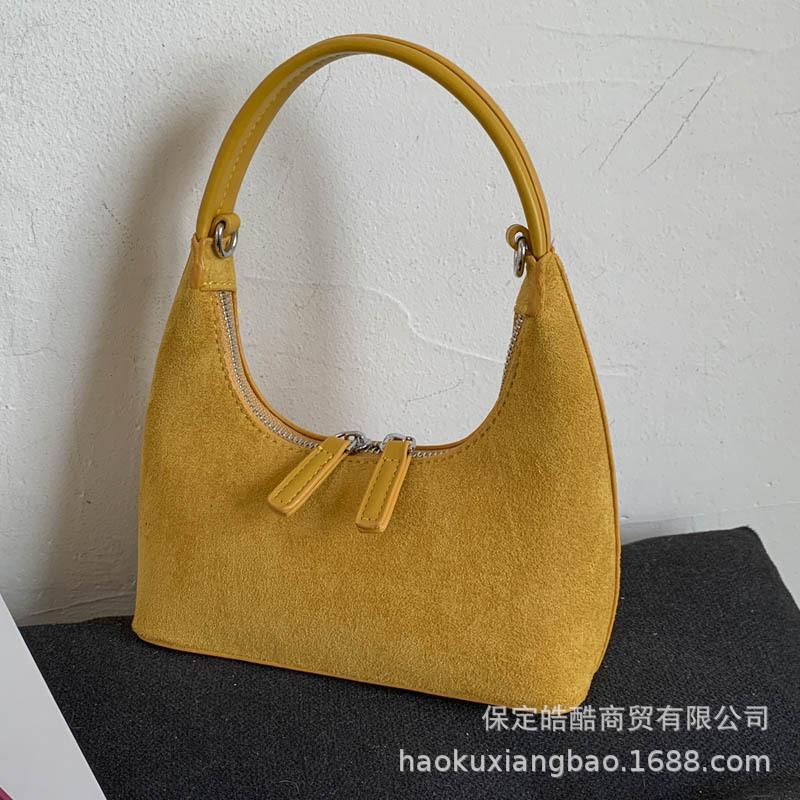 Retro fashion dumpling bag women 2025 new bag high sense light luxury niche commuting single shoulder cross hand bag