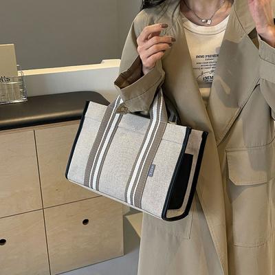 Grote capaciteit canvas tas dames 2025 nieuwe contrasterende kleur retro draagbare tote tas klasse schouder crossbody tas