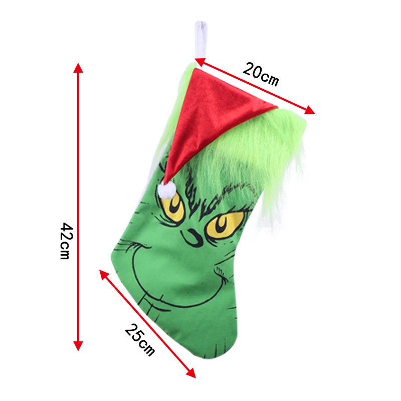 Grinch Santa Climbing Wall Christmas Ornament in Flannel