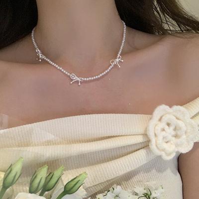Collier simple avec nœud en perles haut de gamme pour femme, style rétro français, léger, luxueux, élégant, tendance, polyvalent, chaîne de clavicule