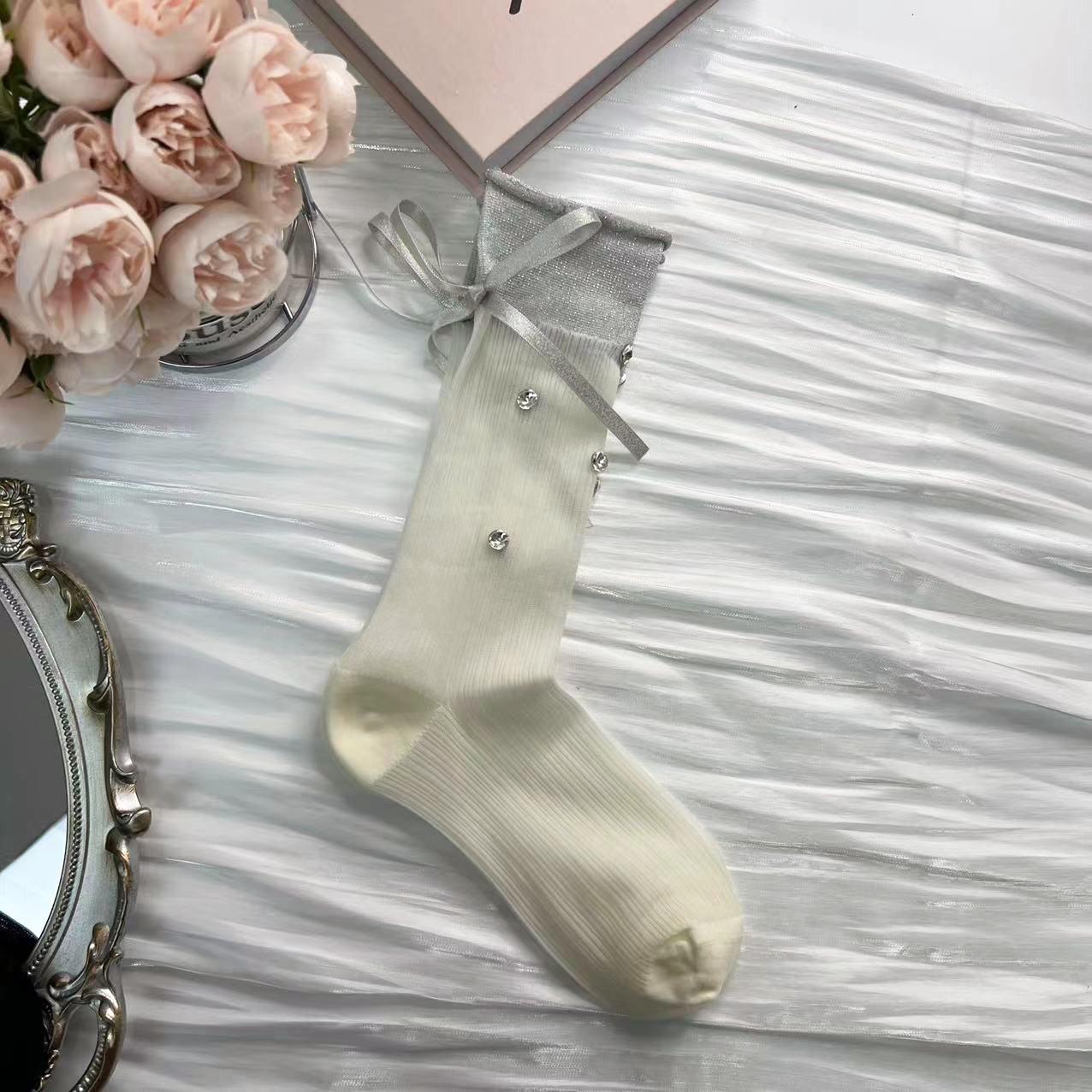 

Женские носки до середины икры с бантиком из страз и серебряной нитью One Size белый