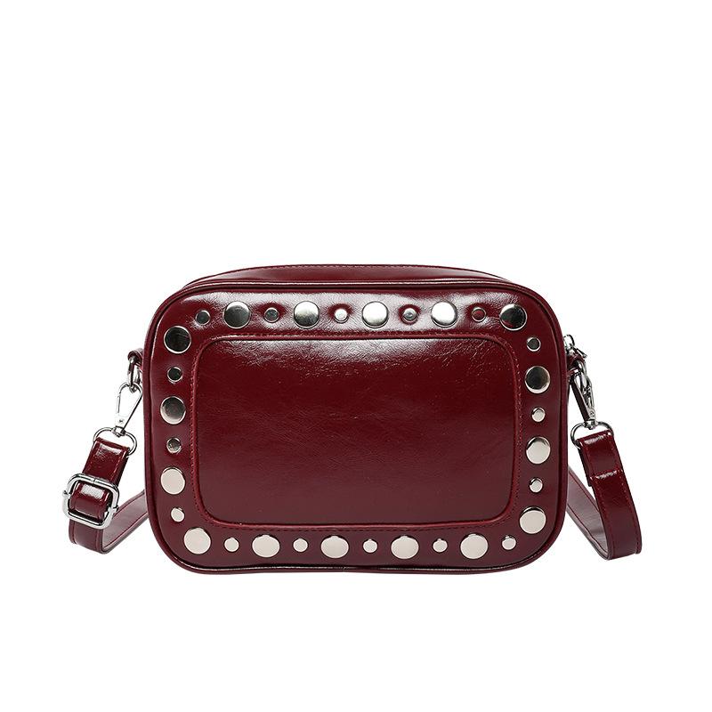 2025 new hot-selling personalized polka dot rivet camera bag niche design simple trend high-end textured messenger bag