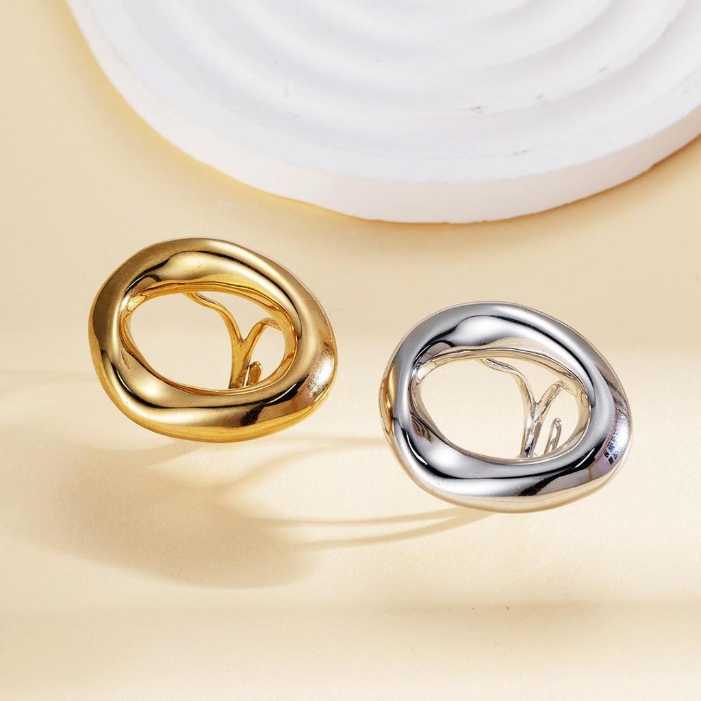 Luxury Geometric Stainless Steel Ring with Bold Lines and Irregular Hollow Design.