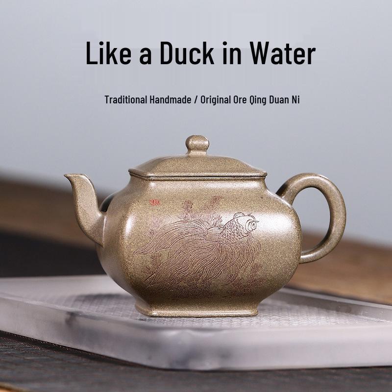 

Handcrafted Yixing Purple Clay Teapot: Original Ore, Fish Engraving, High-End Tea Set Gift Box