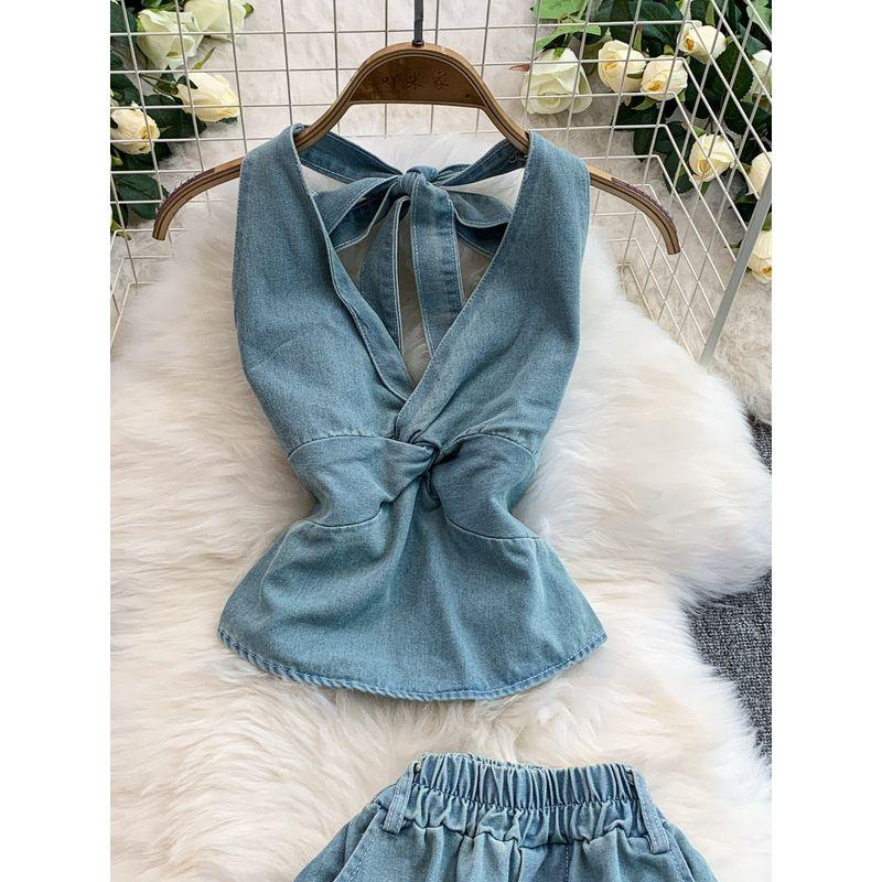 European and American Sexy V-neck Twist Waist Hugging Hanging Neck Denim Vest Top + High Waist Slimming Flared Wide Leg Trousers Set