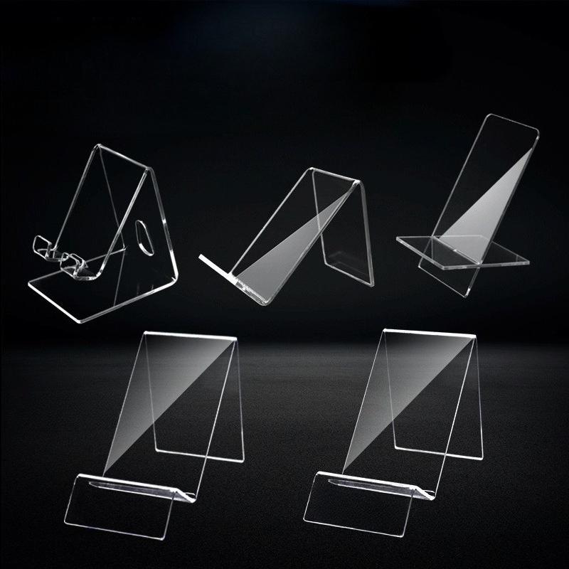 Support d'affichage de comptoir pour téléphone portable Support de bureau multi-formes pour affichage de console de jeu Plusieurs options pour des présentoirs en acrylique à haute transparence
