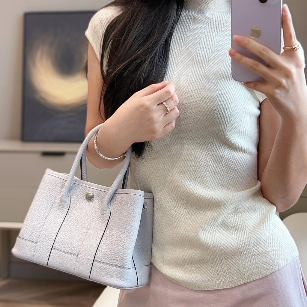 Borsa da giardino cucita a mano con filo cerato, ferramenta interamente in acciaio, borsa da donna portatile in pelle bovina primo strato con motivo a collo di mucca Ntogo