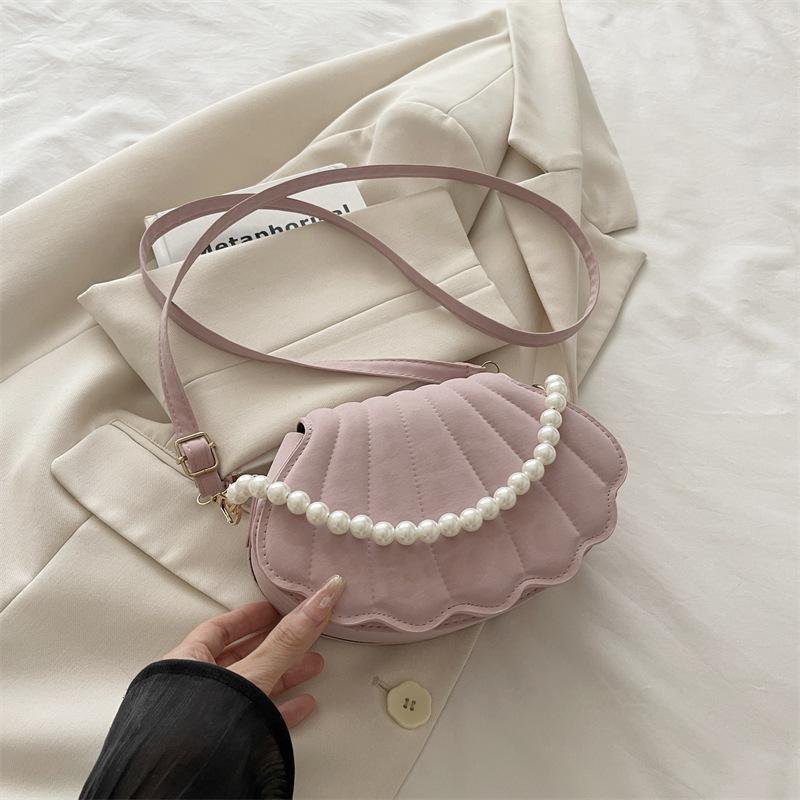 

Нишевая корейская версия сумка-ракушка 2025 осень новая сумка женская модная простая сумка через плечо повседневная сумка-мессенджер для поездок на работу розовый