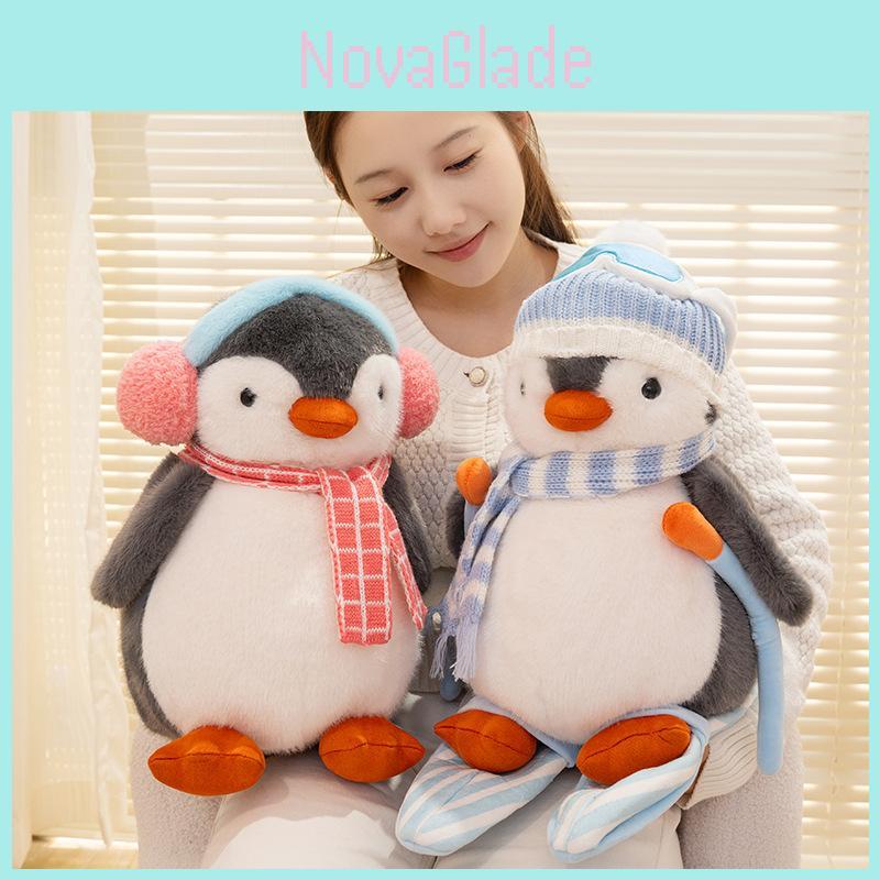 Pinguin-Plüschtier mit Kopfhörerhalter zum Snowboarden – das perfekte Geschenk für Wintersportler